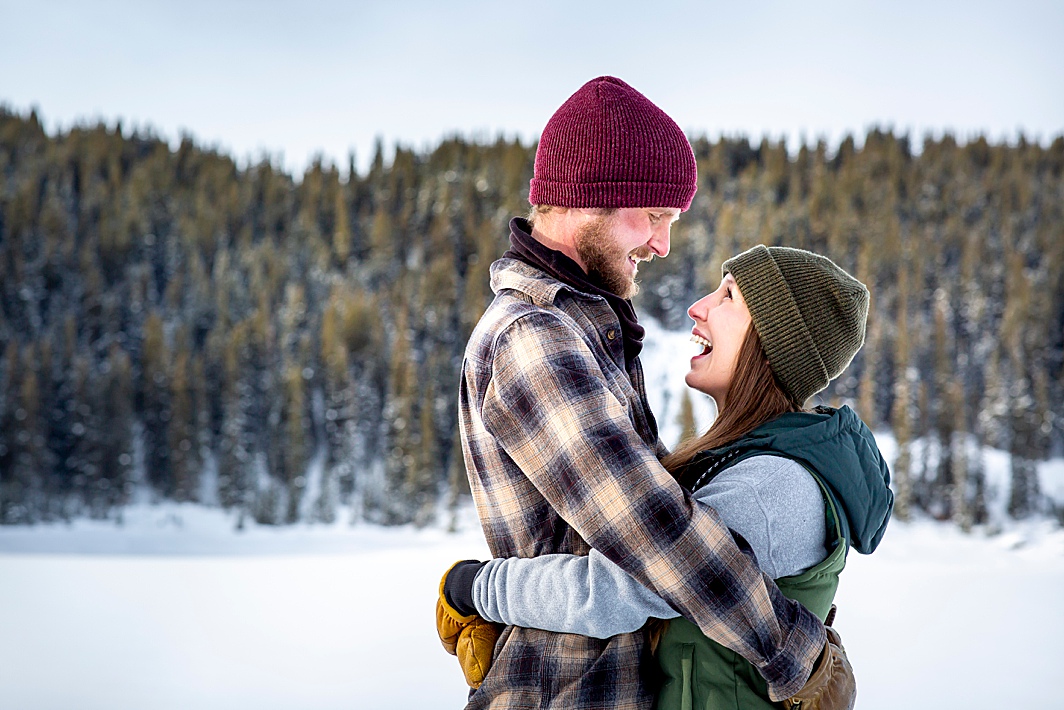 Love this! Cute couple gives loving expressions during their engagement photography shoot with Hillary Shedd Photography in Breckenridge, Colorado. 